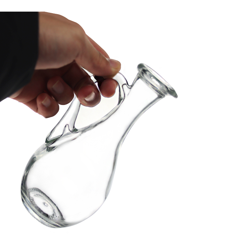 Olive oil glass bottle with a handle